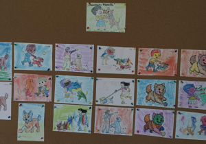 Dzieci z grupy niebieskiej pokolorowały obrazki przedstawiające treningi psów.